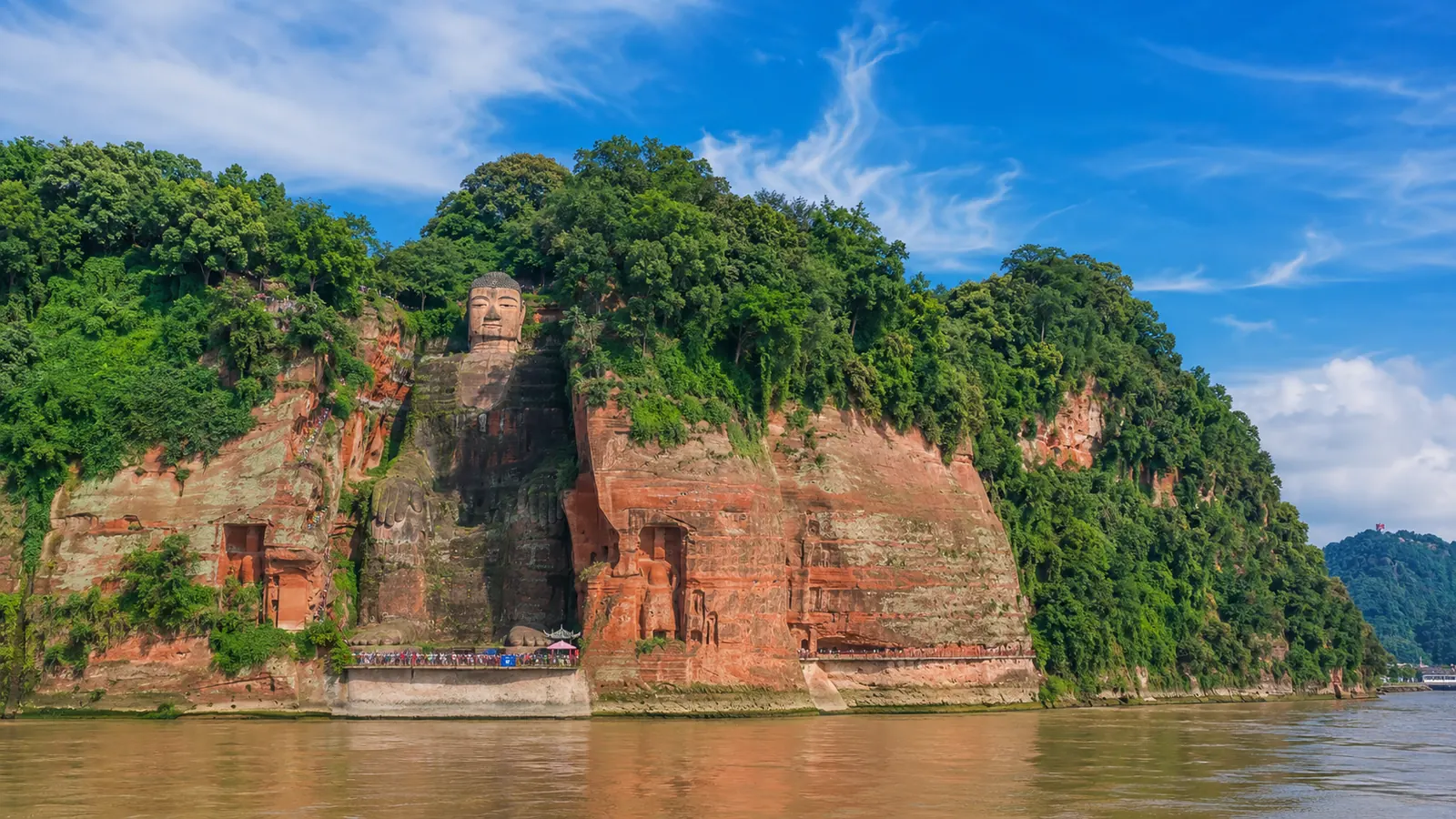 The Leshan Giant Buddha carved into a cliff in Sichuan